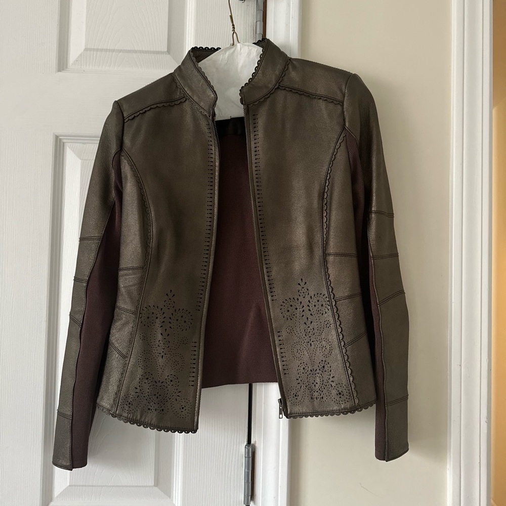 Nygard Bronze leather jacket.Great  with jeans, dresses and turtle necks.